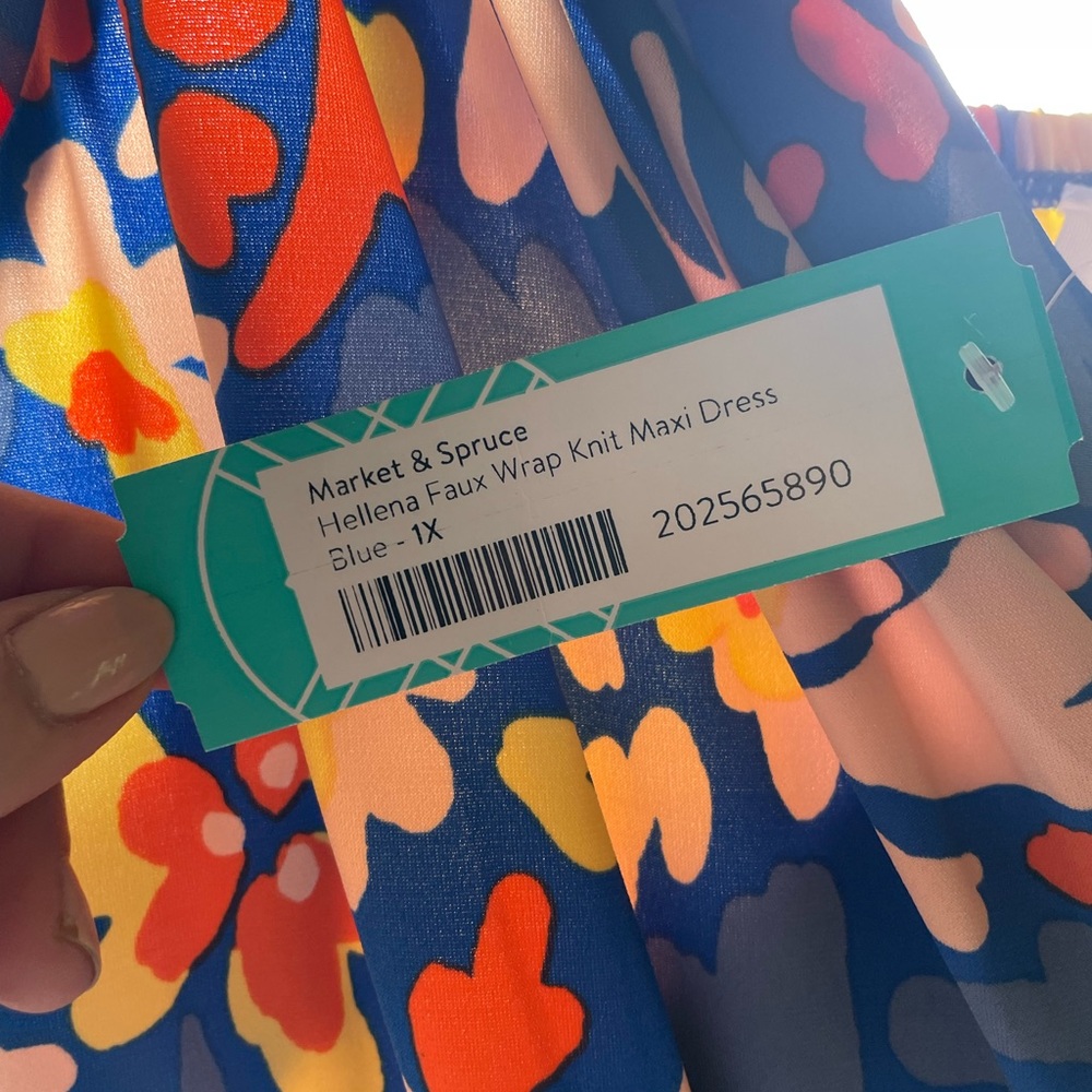 A gorgeous wrap dress from Stitch Fix. NWT & never worn. Smoke & pet free.